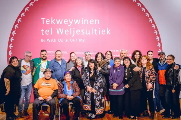 Group of people celebrating a new exhibit